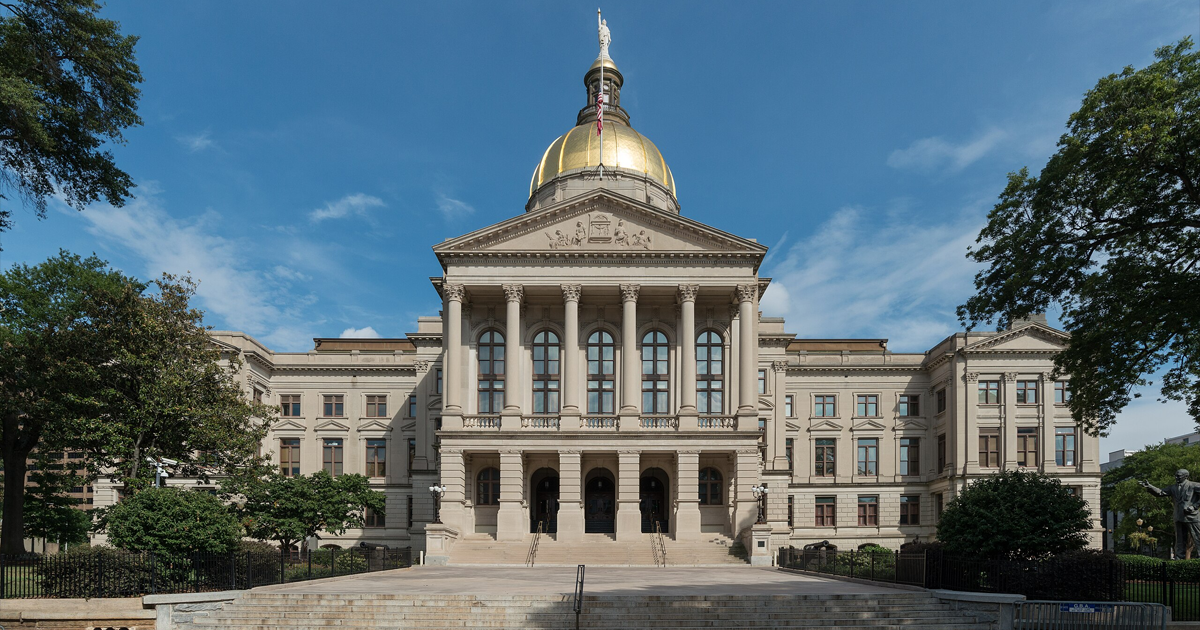 Northwest view of the Georgia State Capitol building in Atlanta, Georgia, with its gold dome and columned facade.
